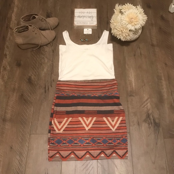 Nollie Dresses & Skirts - Nollie rust colored tribal body con skirt. Sz lg.